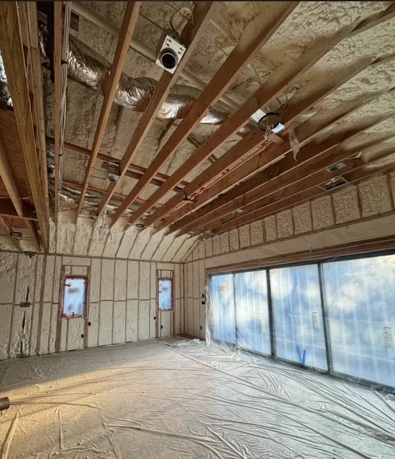 Interior walls and ceiling insulated with spray foam during new construction in Pembroke
